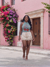 MON CHERI CHERRY GRAPHIC TEE STYLED AS A HALTER TOP, SAGE GREEN VINTAGE WASH.