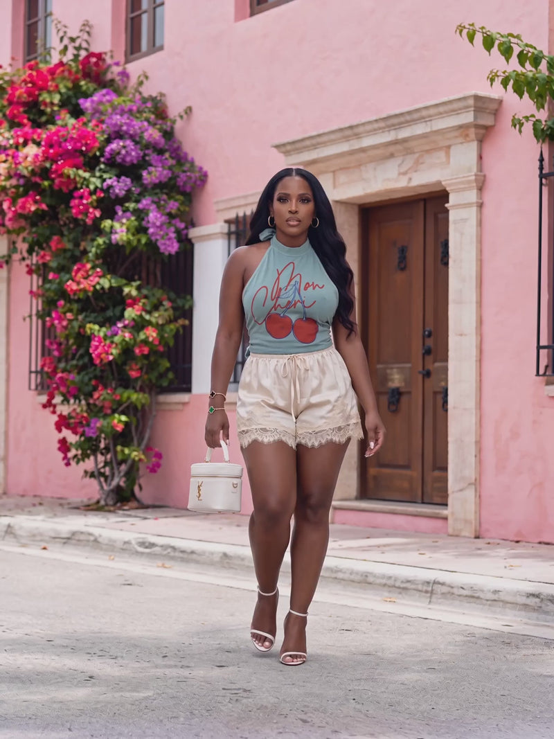 MON CHERI CHERRY GRAPHIC TEE STYLED AS A HALTER TOP, SAGE GREEN VINTAGE WASH.