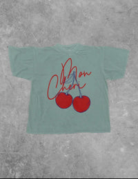 MON CHERI CHERRY GRAPHIC TEE STYLED AS A HALTER TOP, SAGE GREEN VINTAGE WASH.